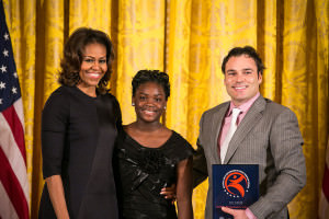 Dan Trahey, right, with Michelle Obama and Asia Palmer