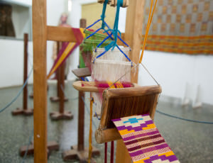 Loom for weaving kente cloth