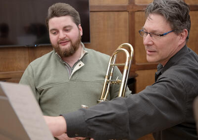 Trombone teacher and student 
