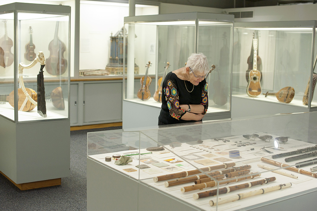 Visitor looking at object in the Collection