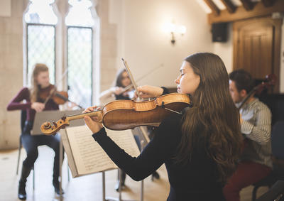 Chamber music students rehearsing