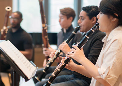 Students playing clarinet