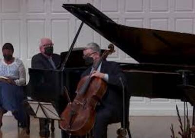 Cello instructor Paul Watkins performs at convocation